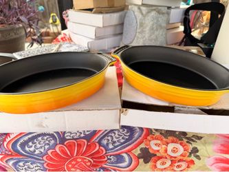 All five Yellow Oval Baker Ceramic cookware 7x9