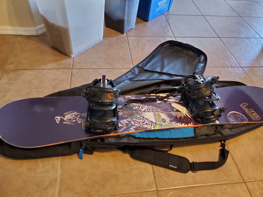 Snowboard gear, board, boots, goggles