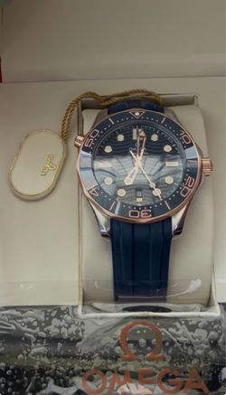 Omega Seamaster Men’s Watch 42mm Rose Gold/Blue Ocean Bezel Stainless Steel Blue Rubber Strap Wristbands