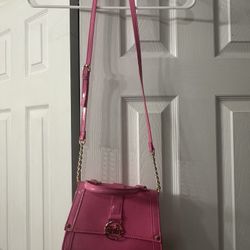 Pink Juicy Couture crossbody bag with gold hardware