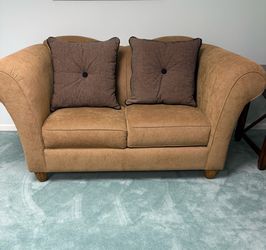 Love seat with pillows, side table, lamp & Chair