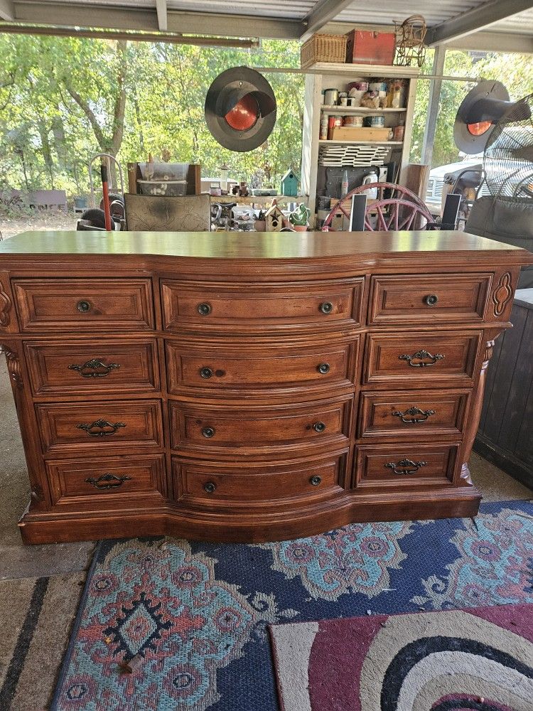 12 Drawer All Wood Dresser. All Drawers Work Great. Picture Shiw Dailey Wear & Tear