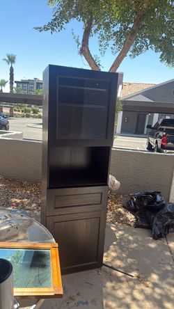 Tall Dark Brown Storage Cabinet with Glass Door