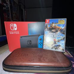 Nintendo Switch With Game, Protective Case, And Two Memory Cards 
