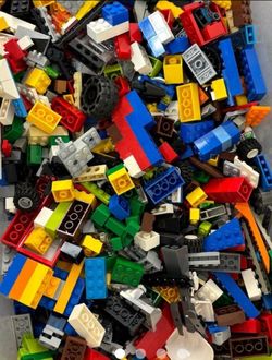 Assorted LEGO building bricks and 10" baseplates