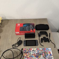 Nintendo Switch Bundle + Accessories & 4 Games – Excellent Condition