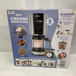 Ninja CREAMi Ice Cream Maker, for Gelato, Mix-ins, Milkshakes, Sorbet, Smoothie Bowls & More, 5 One-Touch Programs, with (2) 16 oz Pint Containers & L