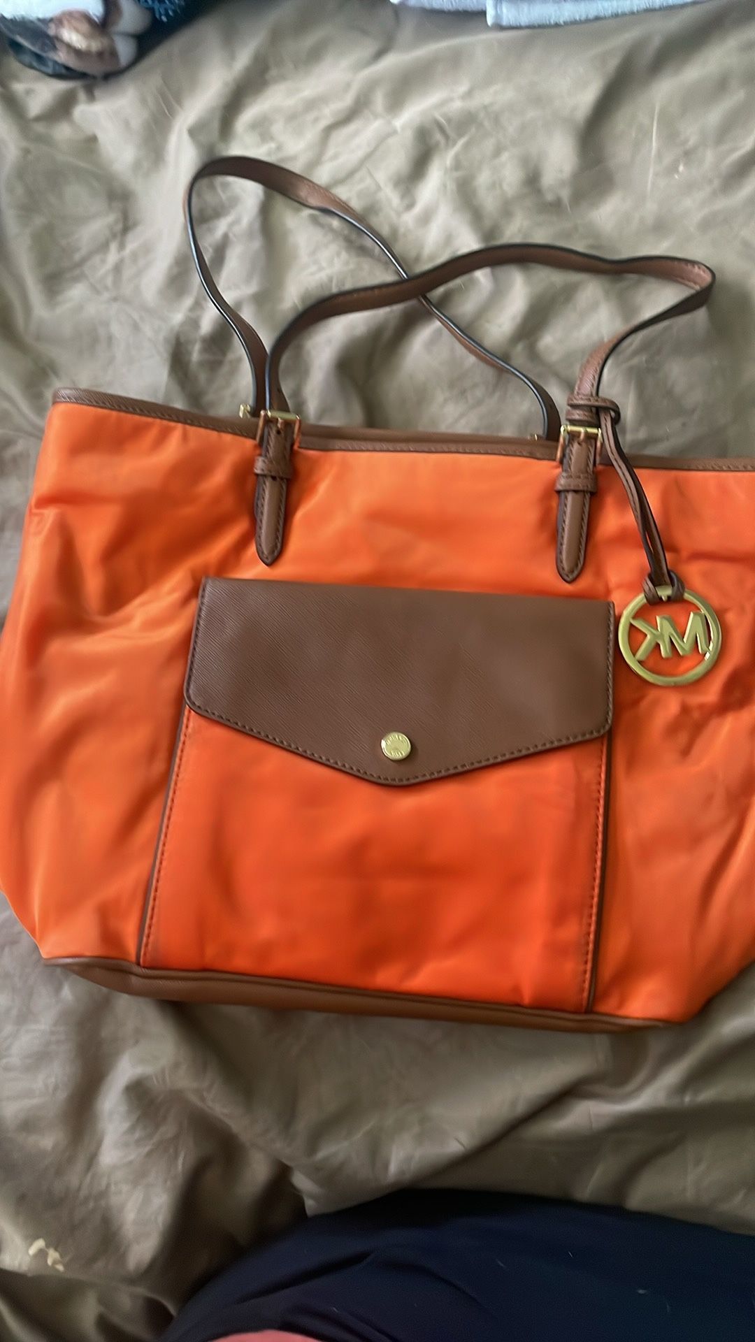 Michael Kors, orange and brown purse great condition