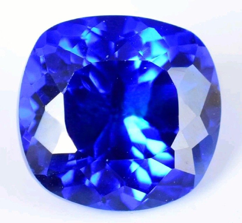 7.15 Ct Loose Blue Zoisite Tanzanite-Like Excellent Cushion Cut Qualit Gemstone. The product is a 7.15 carat loose blue Zoisite Tanzanite-like gemston