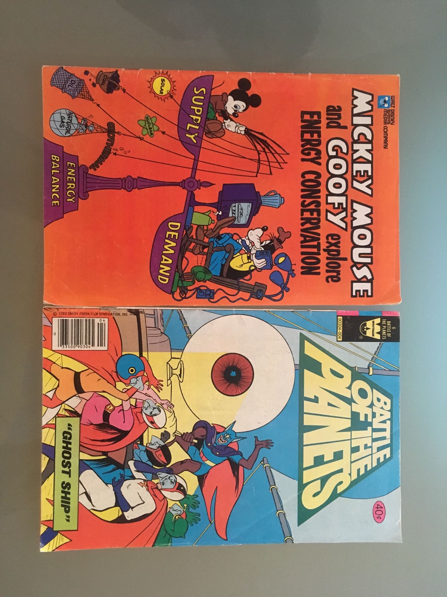 Battle of the planets. Comic book, Mickey Mouse and goofy explore energy conservation