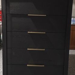 Black and gold dresser
