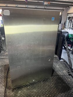 Small Refrigerator 32 1/2” Tall  21” Deep 20 1/2” Wide 