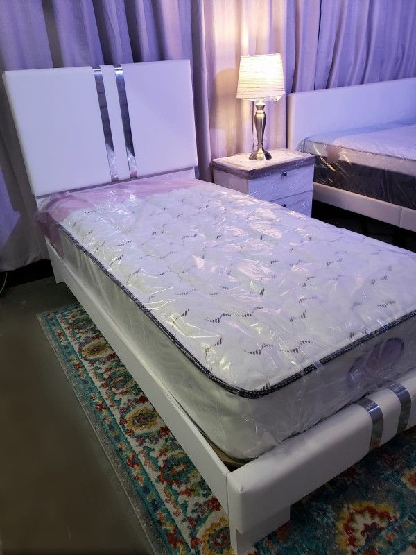 NEW TWIN MATTRESS BED FRAME IS NOT INCLUDED