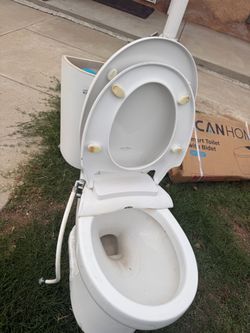 White Two-Piece Toilet with Seat 3 of them