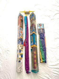 Brand new in the cases (Kites) brand 76 inch dragon kite & 50 inch minion kite, with two other kites