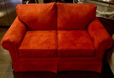 Red loveseat couch (two seats)