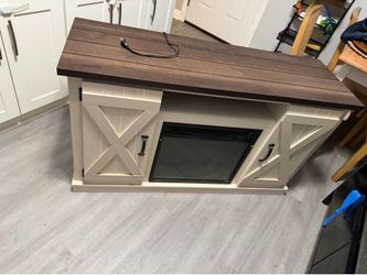 Tv console with fire place