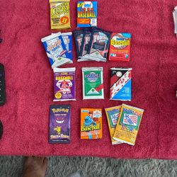 9 Baseball Packs 1990, 1991, 1988, 1992 Packs. 3 Football Packs 1991. 1 Pokemon Pack. 2 World Cup Toons Packs