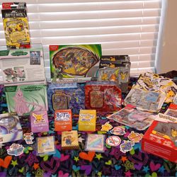 Pokémon Cards  , 2 Gold Metal Cards, Deck Of Gold Foil Cards, 3 Upper Deck Boxes Full Of Cards, And 2 Elite Trainer Boxes And More......