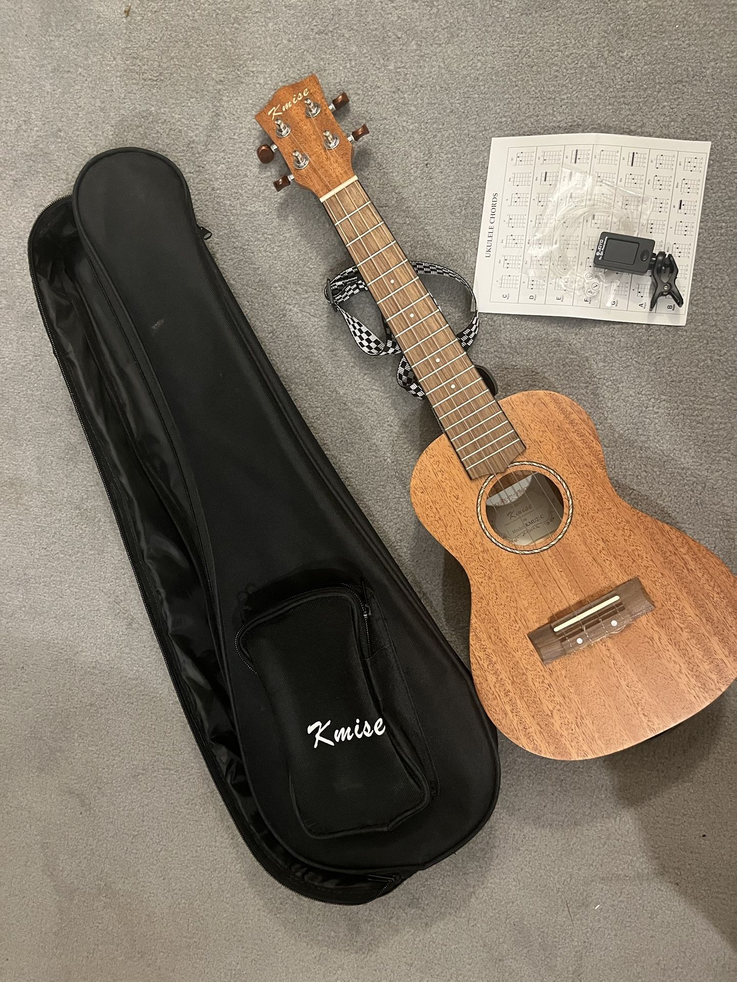 Kmise Ukulele with Bag, Strap, and Tuner