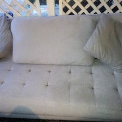 Stylish grey couch and loveseat set