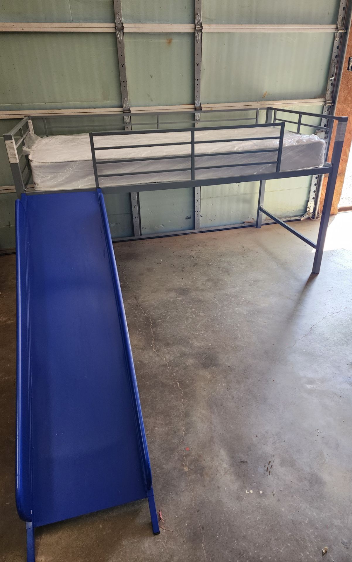 Twin metal loft bed with slide
