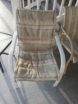 4 lawn chairs and a beach chair