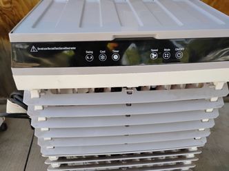 TWO  PORTABLE  EVAPORATIVE  COOLER S