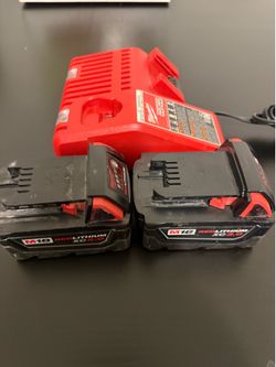 I got two Milwaukee m18 batteries  and charger and good condition