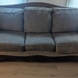 brown couch needs to be picked up