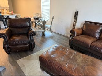 Brown, leather sectional and chair and ottoman