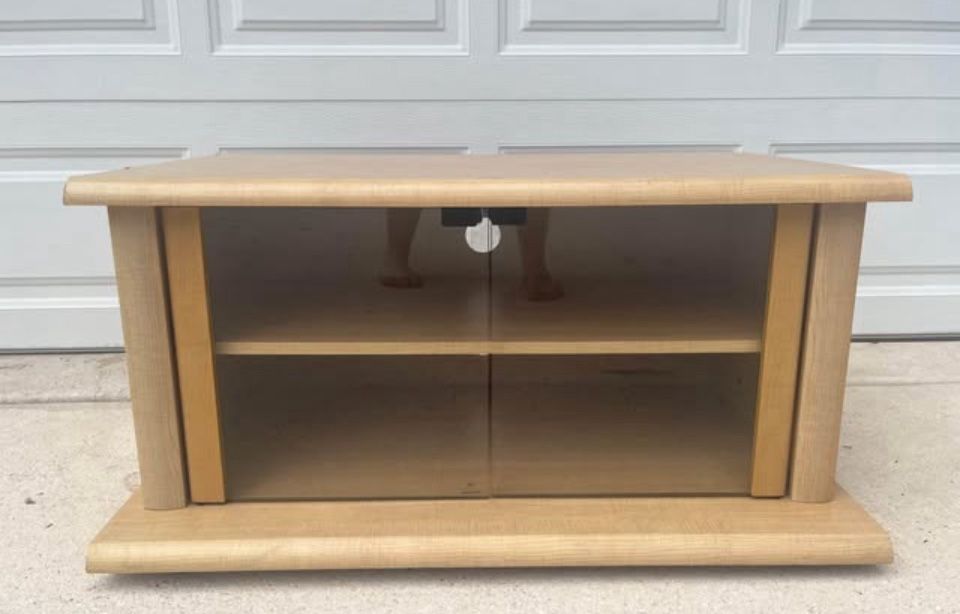 Wooden Entertainment Center With Shelf And Glass Doors $25