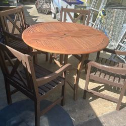 Patio Table With The Four Chairs