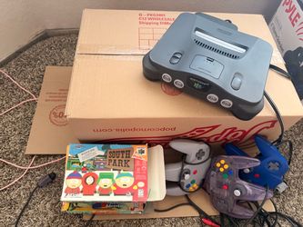 Nintendo 64 w games and 3 controllers
