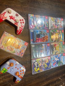 Lot of Nintendo Switch games and controllers