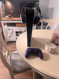 Ps5 not to many scratch works perfectly fine comes with chords and controller and headset no games.