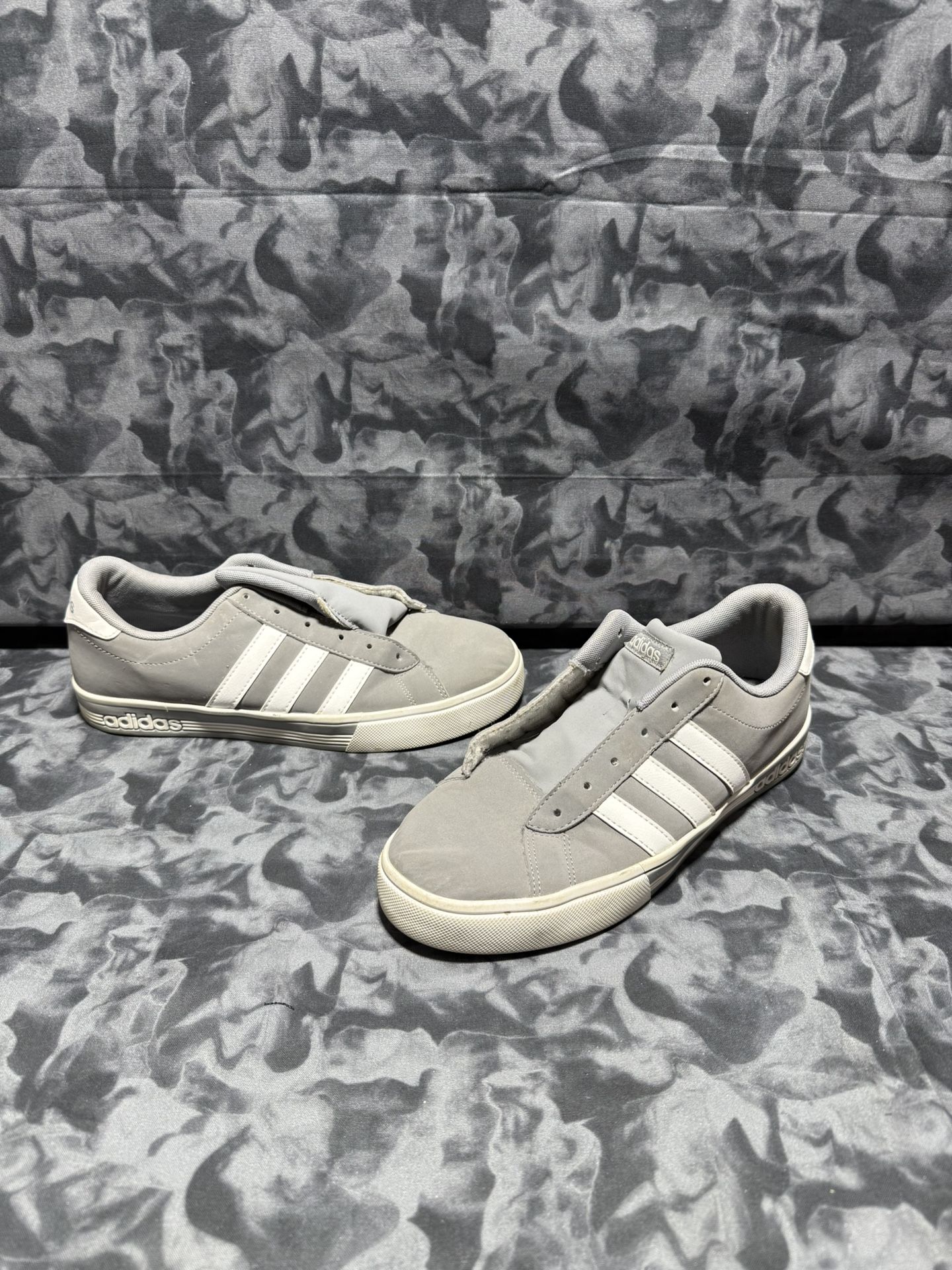 Adidas Men's Daily Team Gray No Lace AW4795 Sneakers Size 7.5  The Adidas Men's Daily Team Gray No Lace AW4795 Sneakers in size 7.5 are a stylish and 