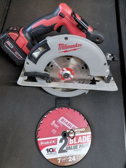 Used brushless  Milwaukee  m18  71/4 circular  saw with used 5.0 battery  and two new Diablo  framing blades $180 firm pick up beaumont  ca no charger