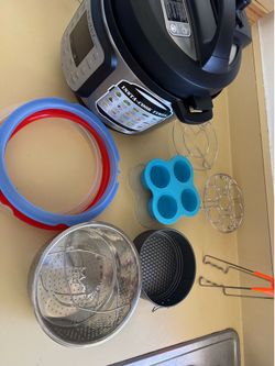Instant Pot Duo Nova pressure cooker and accessories
