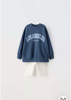 Zara Girl branded blue Los Angeles graphic top and white biker shorts set 10YE