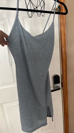 Short grey sparkling dress with small slit on leg