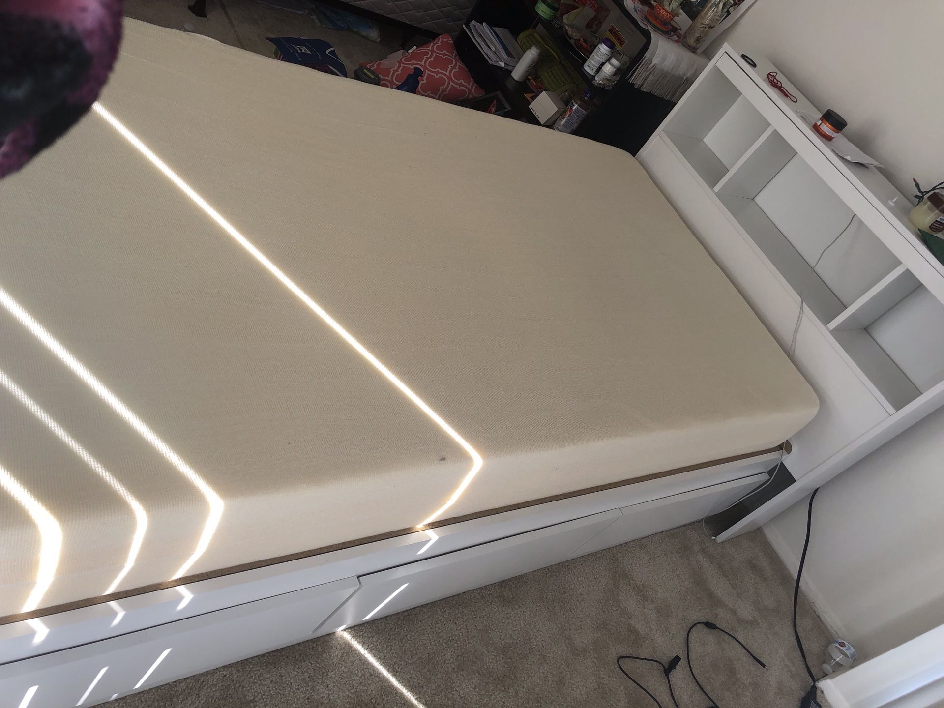 Twin bed with storage and head board