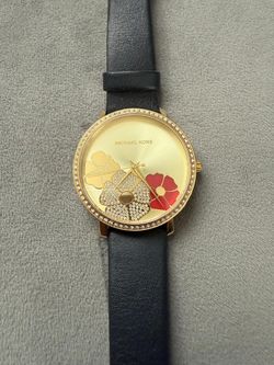 Beautiful mickael kors women watch with brand new battery. (MUST SELL TODAY)