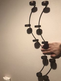 ** 2 new candle holders that hang on the wall