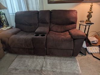 Brown love seat