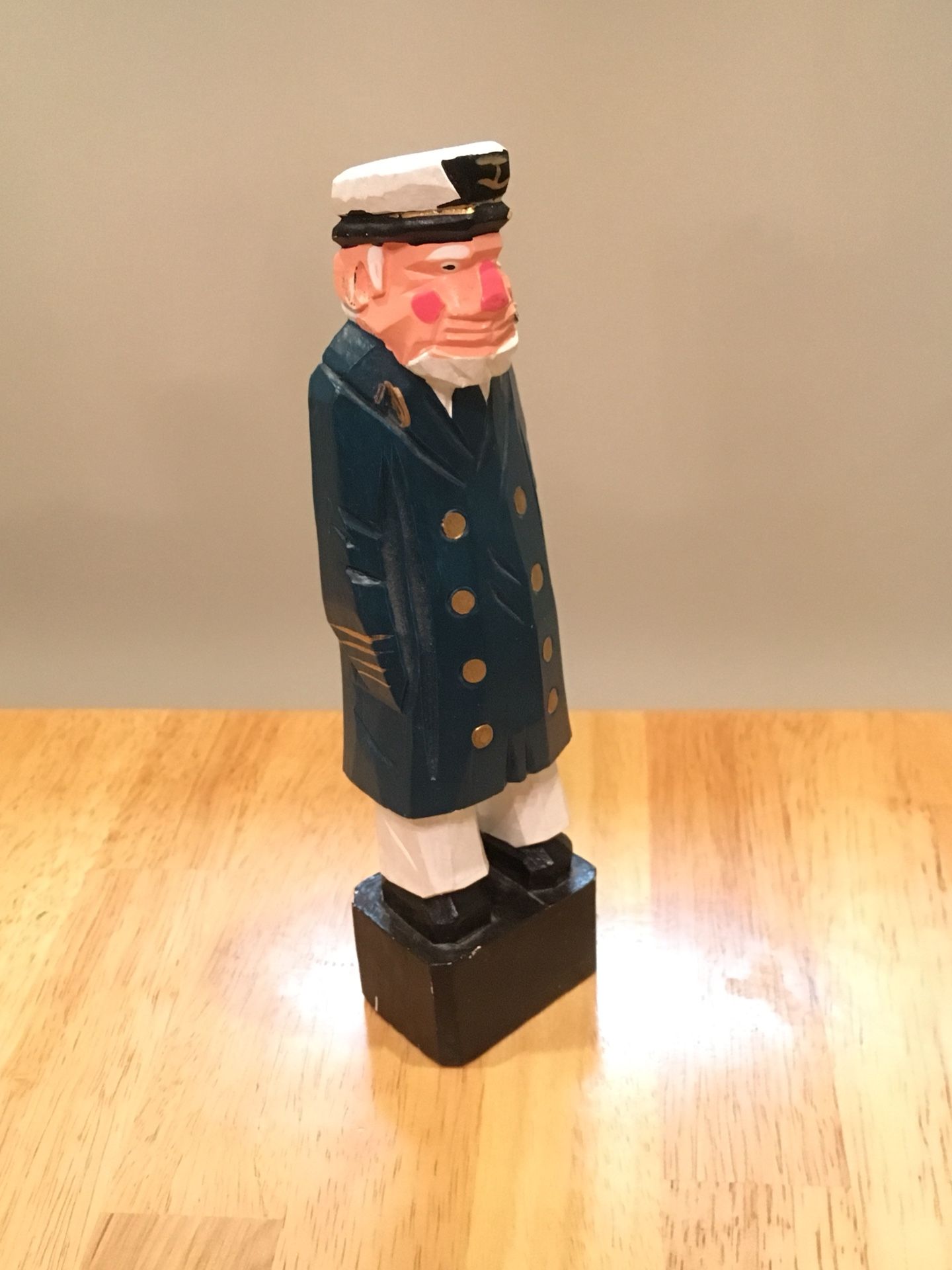 Wooden sea captain statue