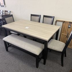 Dining table with 4 chairs and a bench