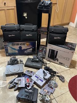Video consoles for sale or buy the lot
