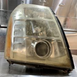 Free 07-14 Cadillac Escalade passenger side headlight