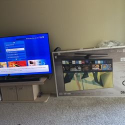 Samsung Qled TV With TV stand And Samsung Soundbar+woofer